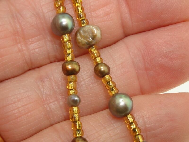 Vintage gold and freshwater pearl choker necklace with gray, taupe, and chocolate pearls.