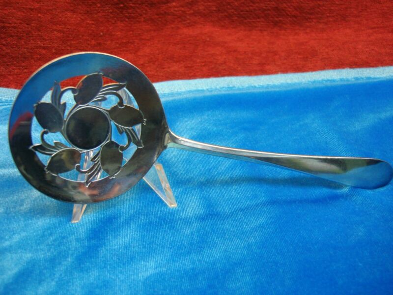 Vintage Wm. Rogers silver plate tomato server with a unique design