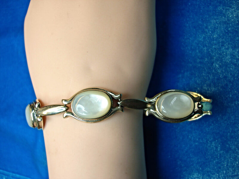 Heavy sterling silver bracelet with six mother-of-pearl stones