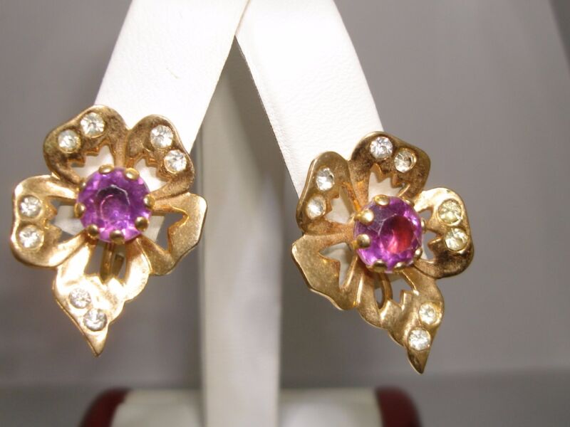 Vintage 1940s gold tone flower earrings with amethyst and rhinestones