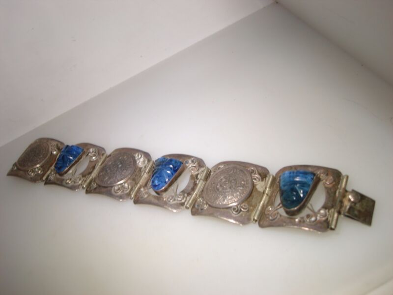 Vintage sterling silver Aztec mask and symbol bracelet, made in Mexico