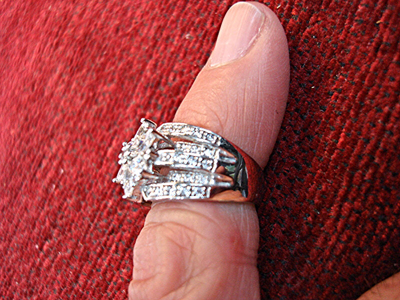 Sterling silver ring with cubic zirconia stones, size 5