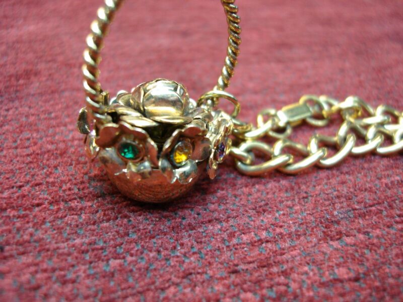 Vintage gold-plated bracelet with colorful flower basket charm