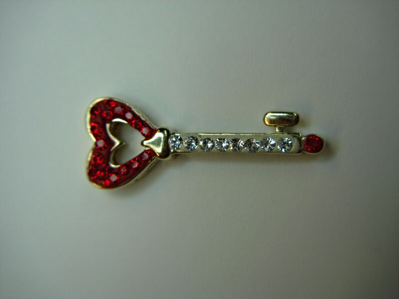 Sterling silver key pendant with red stones and cubic zirconia, unique gift