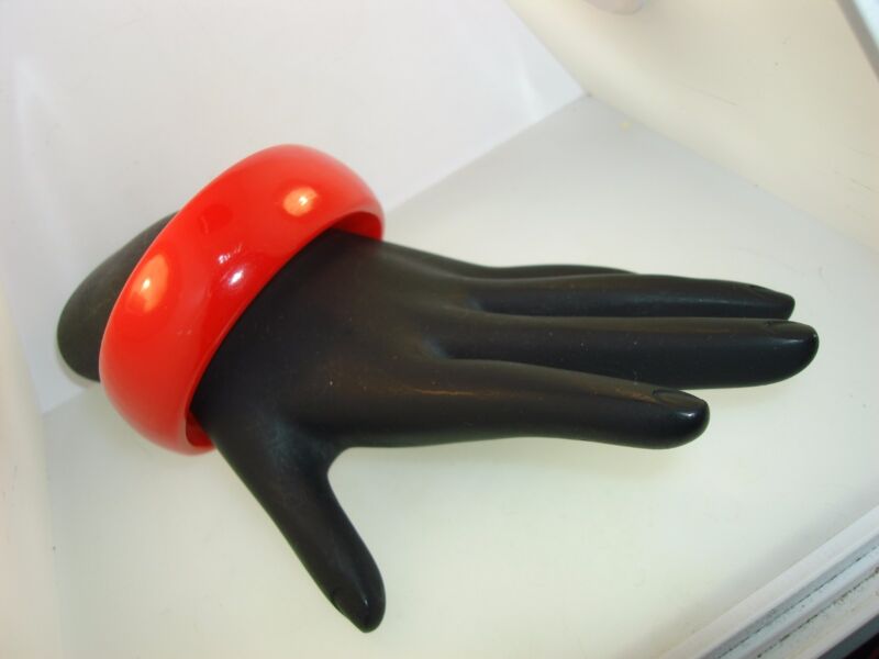 Vintage 1940s-50s lucite bangle bracelet in bright red cherry color