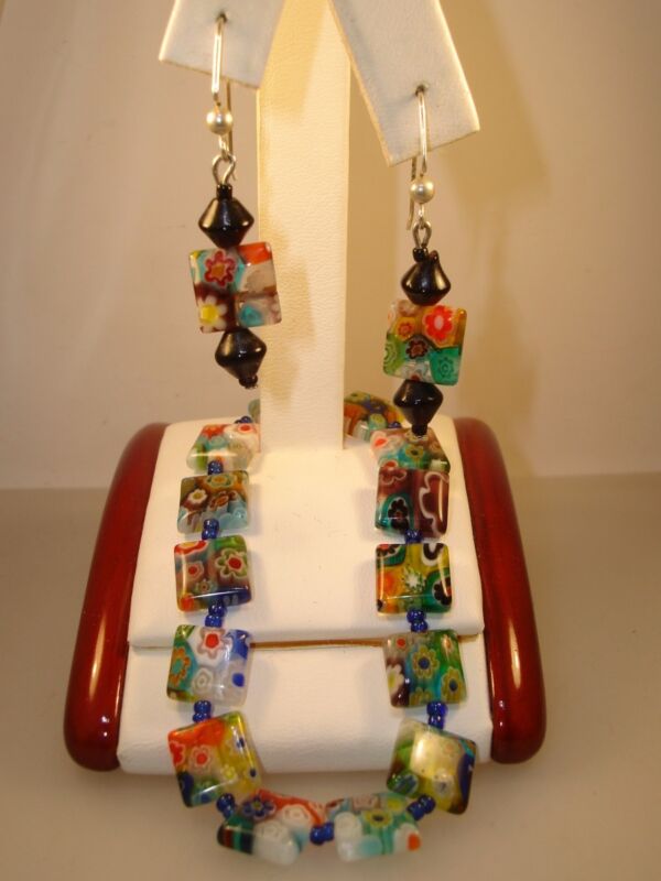 Millifiore glass stretch bracelet and earrings set with multicolored beads, black beads, and silver ear wires