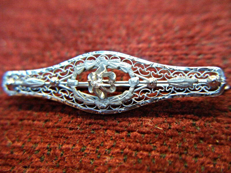 Antique 14K white gold diamond bar pin with 5-point center diamond