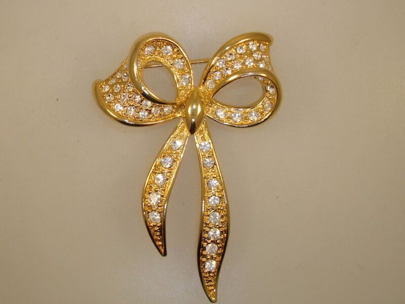 Vintage Napier gold tone rhinestone bow pin/brooch