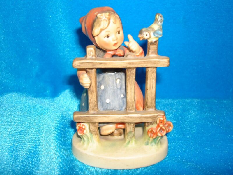 Vintage Hummel figurine #203 2/0 'Signs of Spring' depicting an adorable girl at a fence