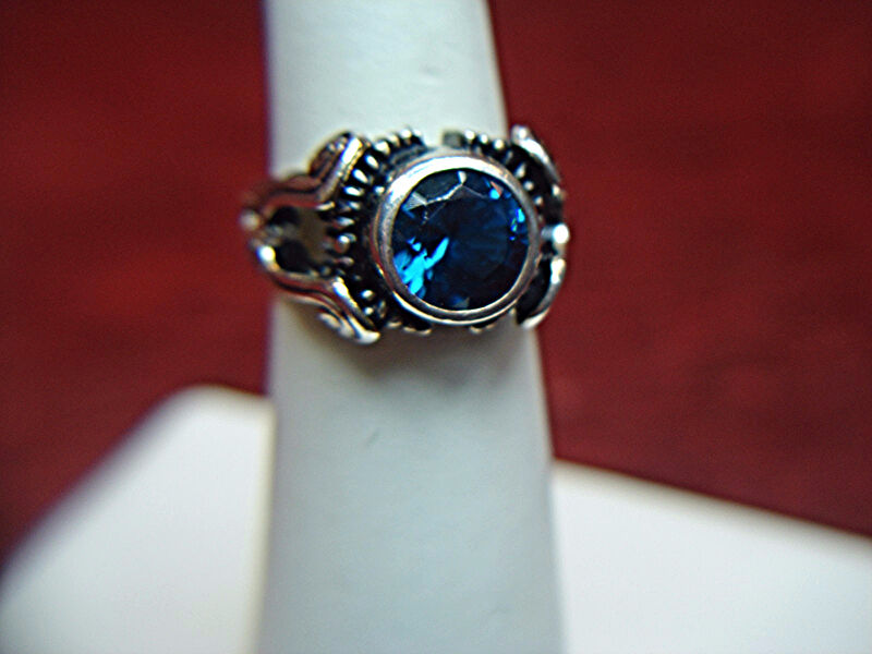 Sterling silver ring with a blue stone, size 6