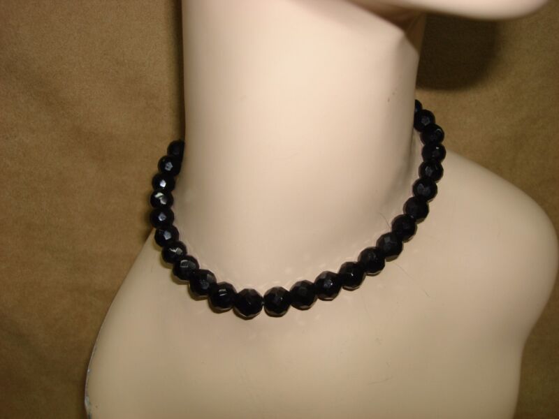 Vintage black glass beaded choker necklace with faceted beads.
