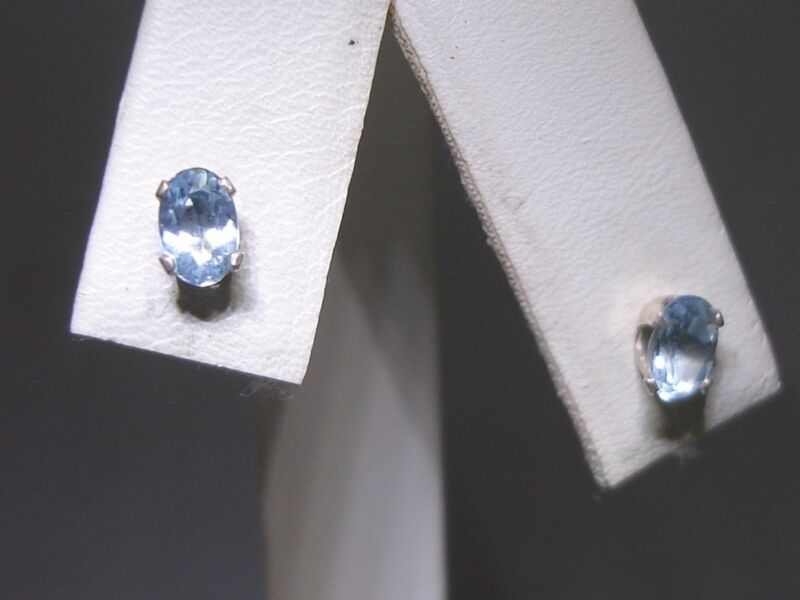 Sterling silver earrings with blue topaz gemstones