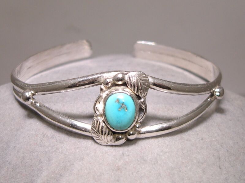 Vintage Navajo sterling silver and turquoise bracelet by J.W. (Circle J.W.)
