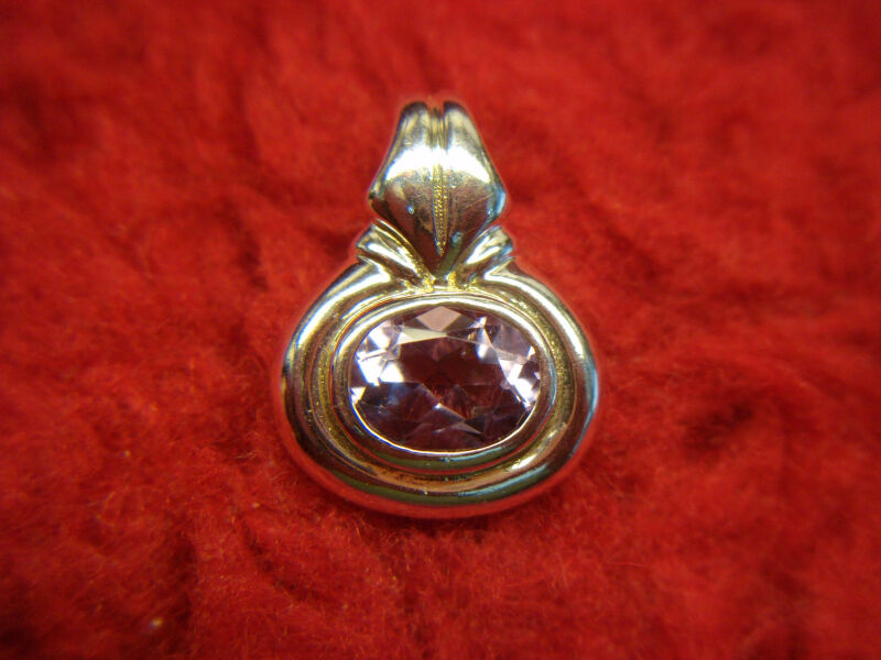 Sterling silver amethyst pendant with oval gemstone