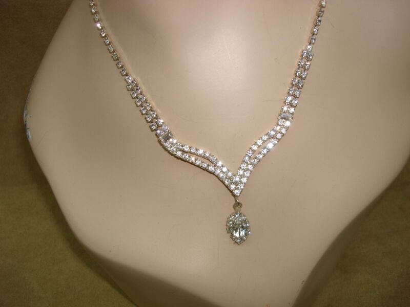 Vintage rhinestone necklace with clear foiled and emerald accents, 17 inches long