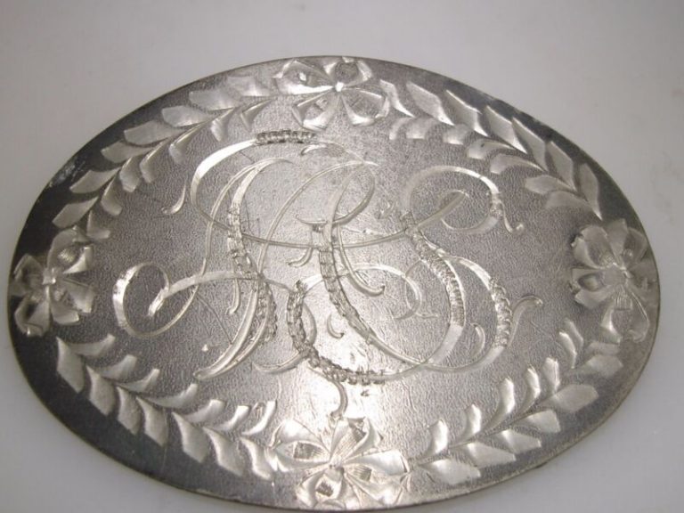 Vintage Art Nouveau floral initial pin with etched design, initials A A S