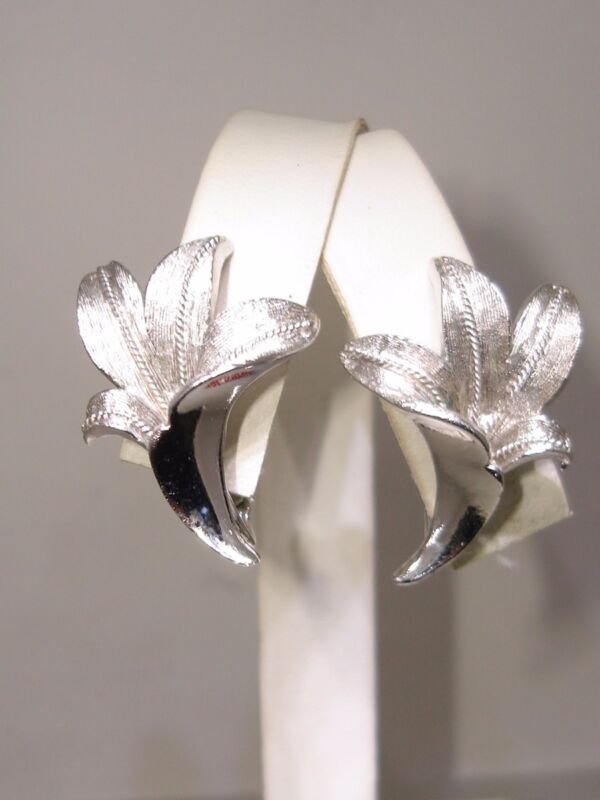 Vintage Coro silver lily earrings from the 1960s