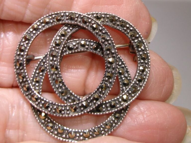 Vintage sterling silver and marcasite interlocking circles pin signed CW