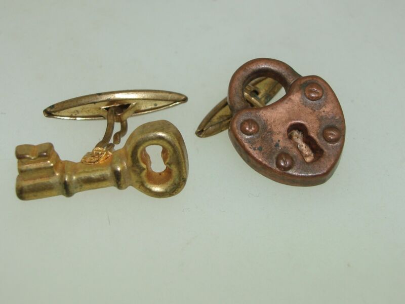 Vintage lucite and gold-washed cufflinks, padlock and key design, 1940s-50s