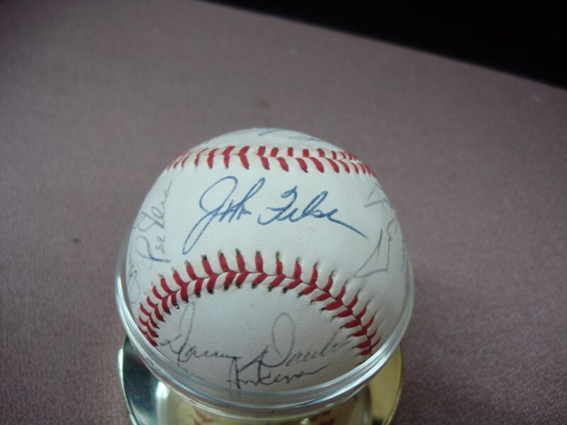 Signed baseball from the mid-1980s Philadelphia Phillies with autographs from Steve Carlton, Paul Owens, Pete Rose, and Garry Maddox.
