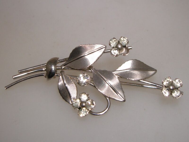 Vintage Krementz silver leaf rhinestone pin