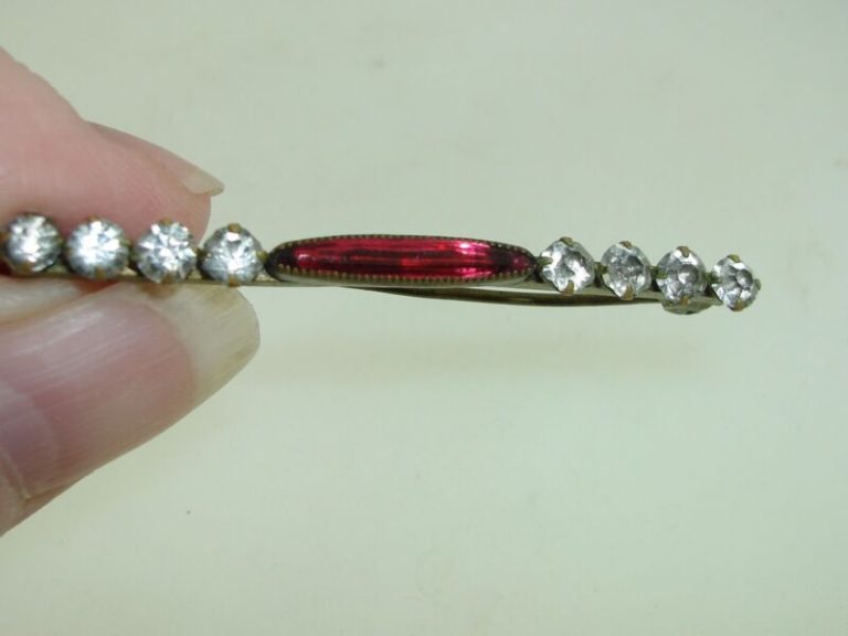 Antique Victorian gold washed bar pin with red foiled glass stone