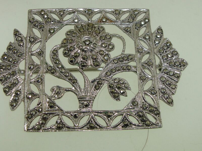 Vintage Art Nouveau sterling silver filigree brooch with marcasite floral design