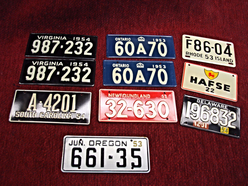 Set of 10 vintage Wheaties bicycle license plates, General Mills cereal collectibles from the 1950s.