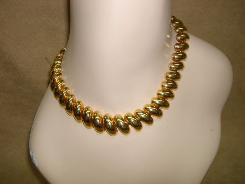 Vintage Napier gold tone choker necklace from 1988 with patent number 4,774,743