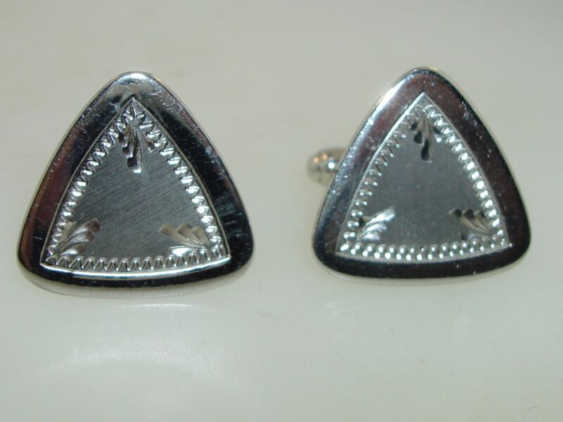 Vintage sterling silver cufflinks with a brushed finish, dating from the 1960s-70s.
