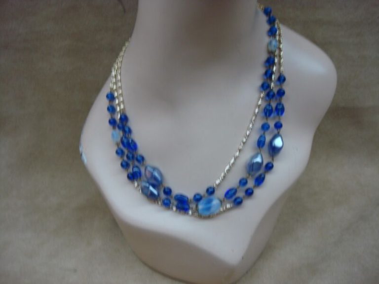 Vintage cobalt blue and frosted glass bead necklace on a gold chain