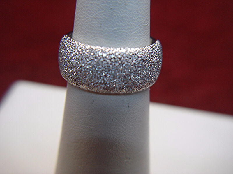Sterling silver band ring with stippling and cubic zirconia accents, size 7