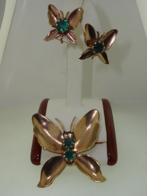 Vintage rose gold butterfly pin and earrings set with green rhinestones