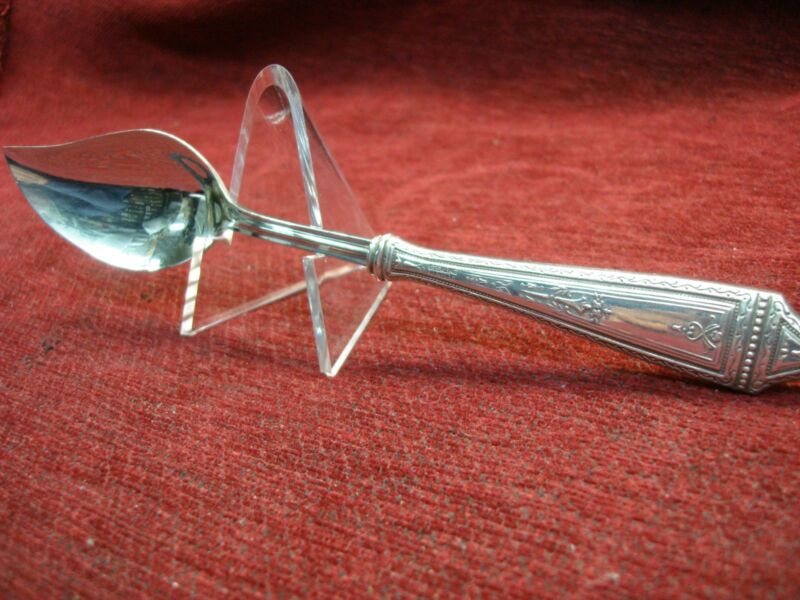 Vintage sterling silver handle jelly server with intricate detailing