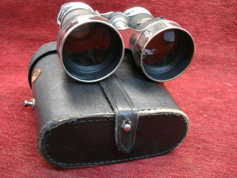 Antique Chevalier leather covered binoculars with case