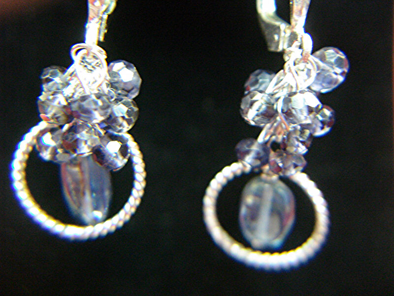 Sterling silver blue topaz leverback earrings with a 1 3/8 inch dangle