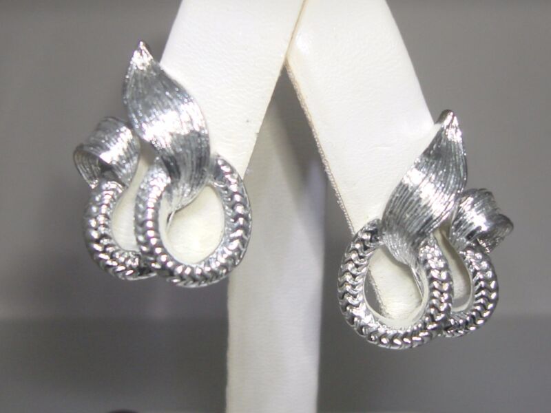 Vintage Lisner brushed silver earrings, featuring braided ovals and loops