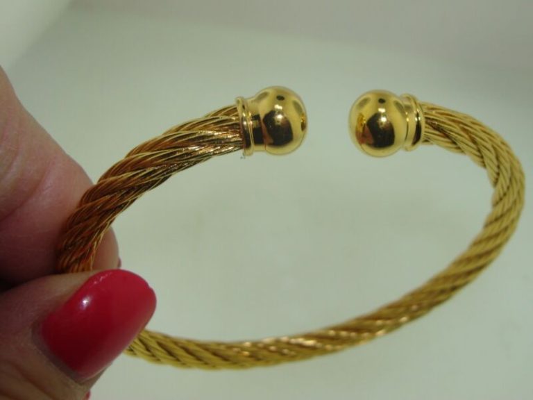 Gold-tone cuff bracelet with intertwined design