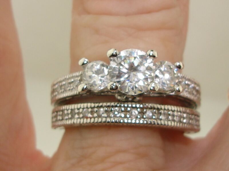 Sterling silver engagement and wedding ring set with cubic zirconia