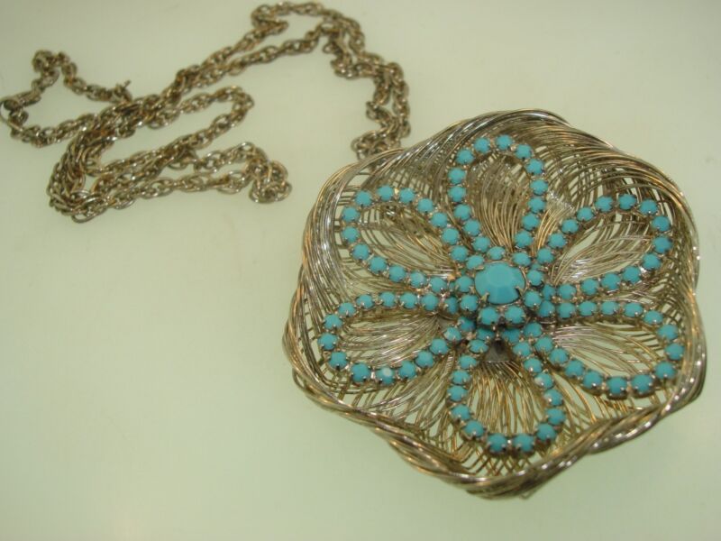 Vintage 1960s spun silver wire flower pendant necklace with blue rhinestones