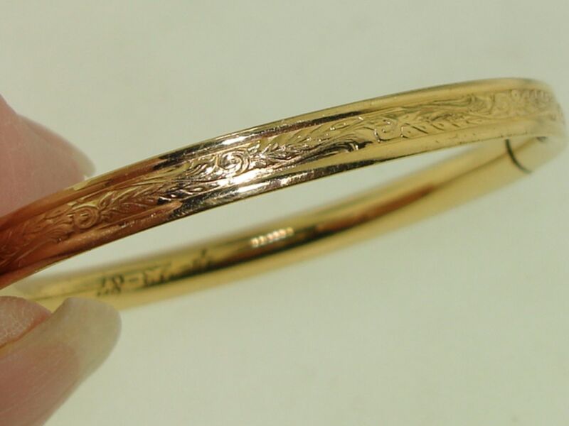 Vintage B.A.B. gold overlay bangle bracelet with engraved design, dated 1987