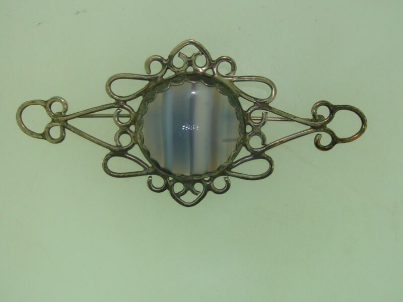 Artisan sterling silver filigree pin with purple and white agate cabochon
