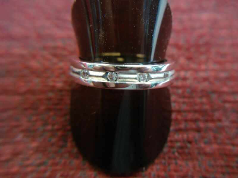 Sterling silver band ring with cubic zirconia stones, size 10