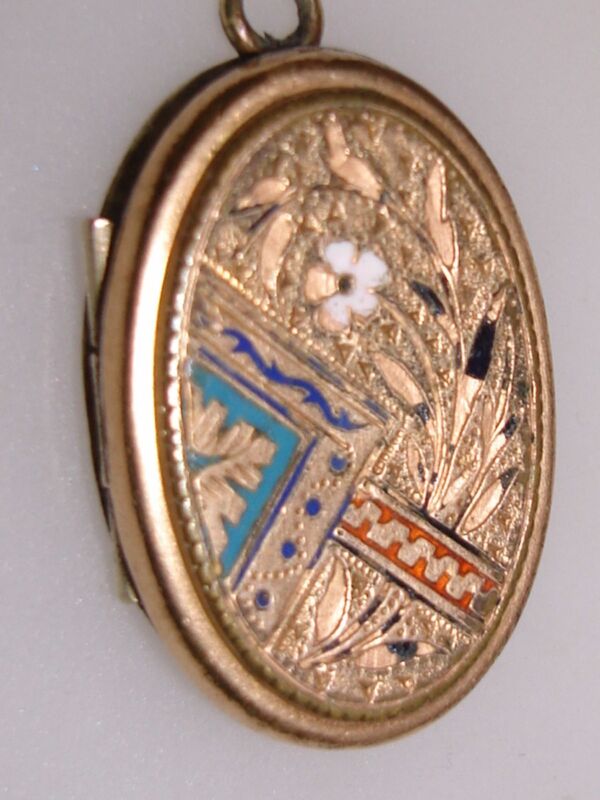 Victorian Aesthetic Movement enamel locket with daguerreotype portrait