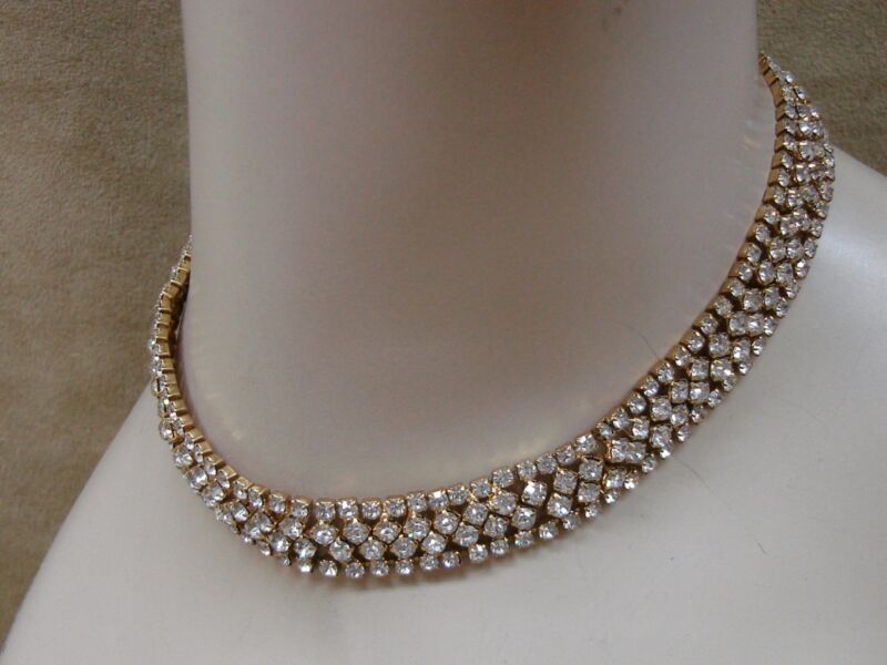 Gold-tone rhinestone choker necklace with four rows of sparkling rhinestones