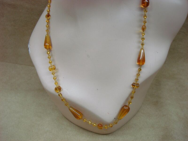 Vintage 1960s amber glass bead necklace with teardrop, peanut and bugle beads