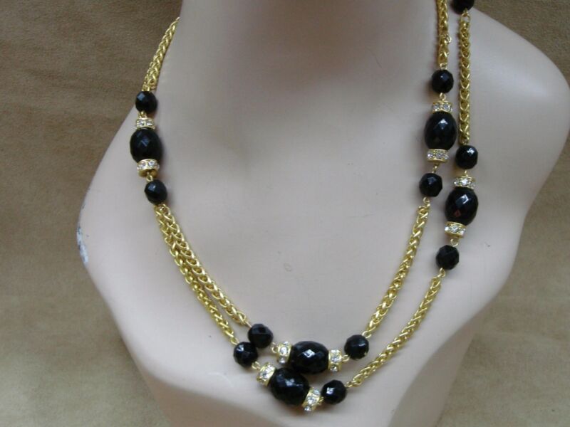 Vintage 1970s gold-tone wheat chain necklace with black beads and rhinestone rings