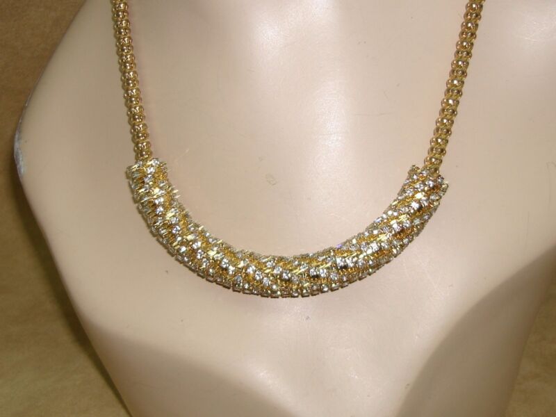 Alfani rhinestone necklace with a curved tube design and prong-set rhinestones.