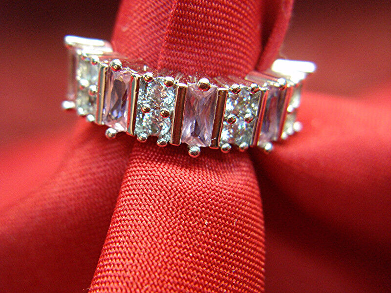 Sterling silver cocktail ring with pink stones and cubic zirconia