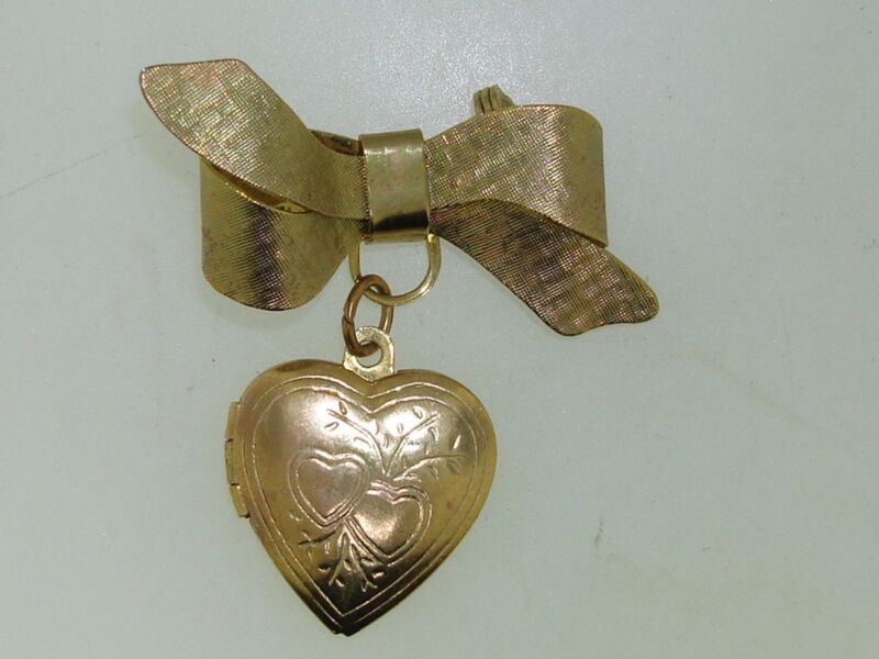 Vintage brushed gold bow brooch with heart locket pendant, 1950s-60s
